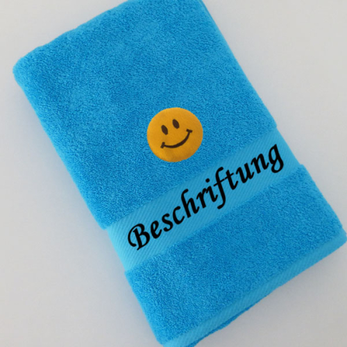 Smiley Stickmotiv auf Handtuch mit Namen