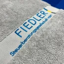 Handtuch mit Logo-Bestickung