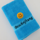 Smiley Stickmotiv auf Handtuch mit Namen